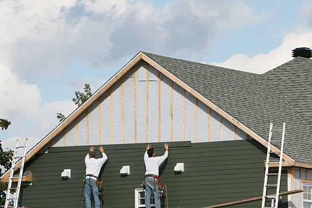 Professional Siding Installation technician working in Newport, WA